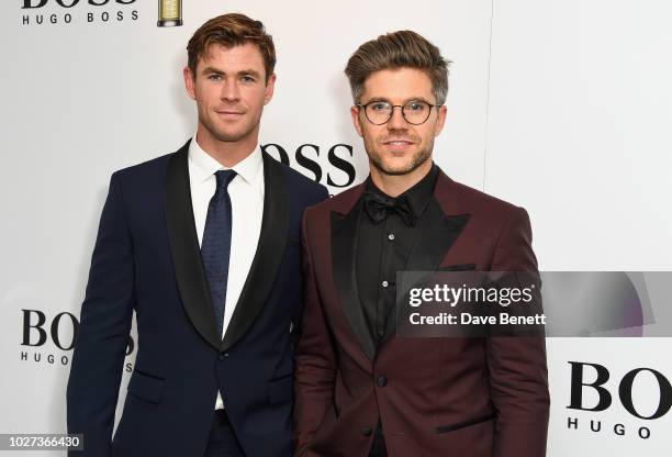 Chris Hemsworth and Darren Kennedy attend the GQ Men of the Year Awards 2018 in association with HUGO BOSS at Tate Modern on September 5, 2018 in...