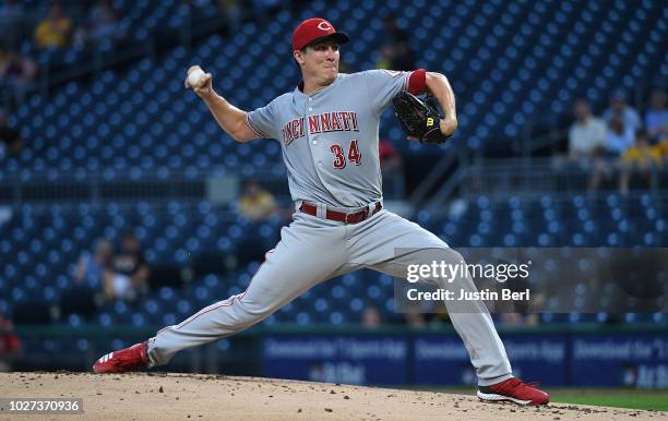 Homer Bailey of the Cincinnati Reds delivers a pitch in the first inning during the game against the Pittsburgh Pirates at PNC Park on September 5,...