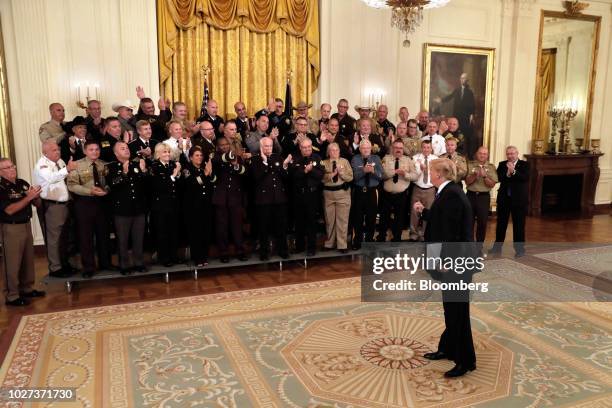 President Donald Trump arrives for a meeting with sheriffs from across the country at the White House in Washington, D.C., U.S., on Wednesday, Sept....