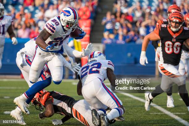 Rafael Bush of the Buffalo Bills runs with an intercepted pass during the second half against the Cincinnati Bengals at New Era Field on August 26,...