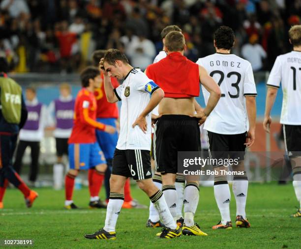 Dejected Philipp Lahm of Germany after defeat in the 2010 FIFA World Cup South Africa Semi Final match between Germany and Spain at Durban Stadium on...