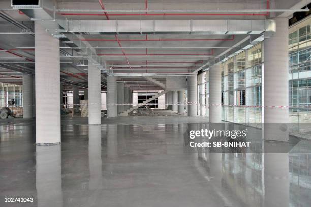 concrete building - commercial flooring stock pictures, royalty-free photos & images