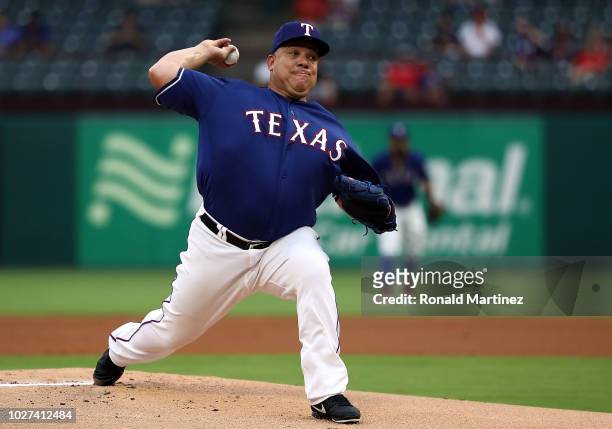 Bartolo Colon of the Texas Rangers throws against the Los Angeles Angels in the first inning at Globe Life Park in Arlington on September 5, 2018 in...