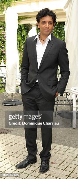 Director M. Night Shyamalan poses as he attends 'Le Dernier Maitre de L'air' Paris Photocall at Hotel Bristol on July 9, 2010 in Paris, France.