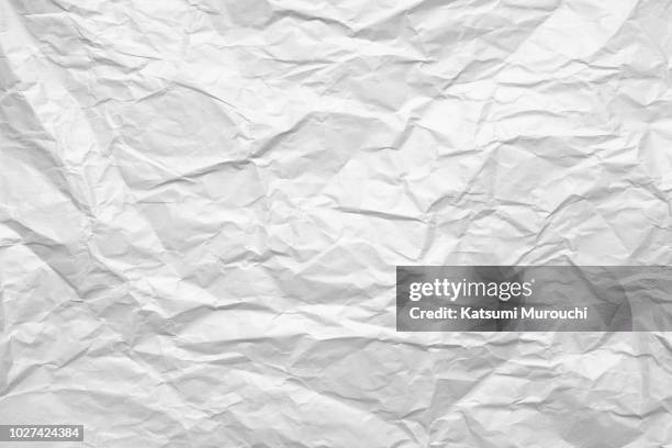 wrinkled paper texture background - arrugado fotografías e imágenes de stock