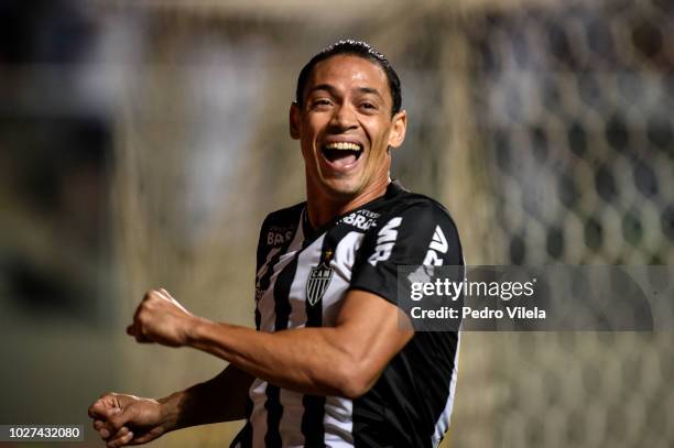 Ricardo Oliveira of Atletico MG celebrates after Regis of Sao Paulo scores an own goal during a match between Atletico MG and Sao Paulo as part of...