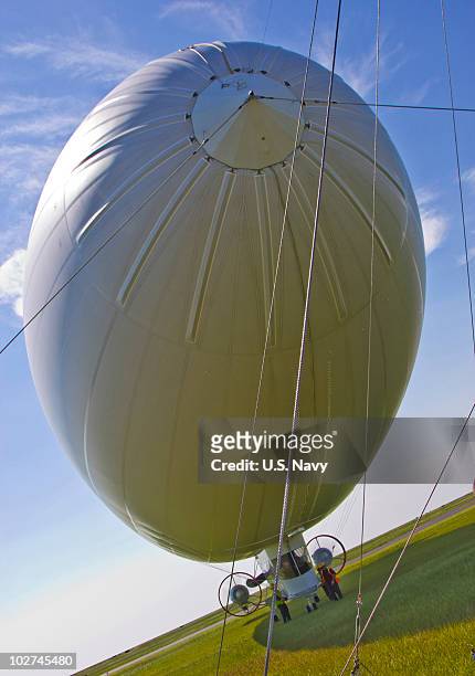 Navy MZ-3A manned airship, Advanced Airship Flying Laboratory, derived from the commercial A-170 series blimp lands at Lake Front Airport on July 8,...