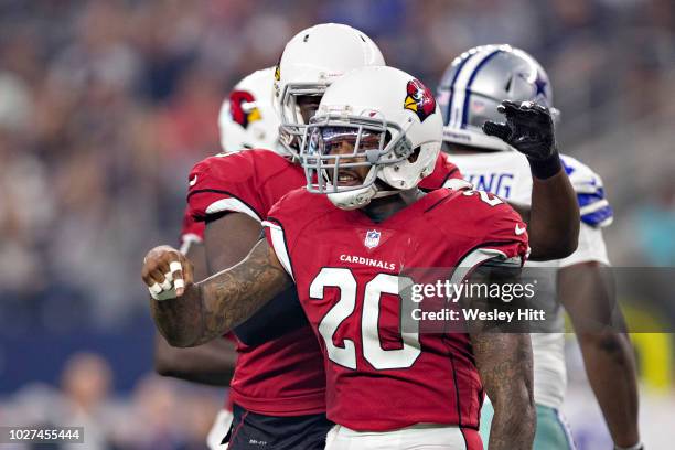 Deone Bucannon of the Arizona Cardinals celebrates after sacking the quarterback during a game against the Dallas Cowboys at AT&T Stadium during week...