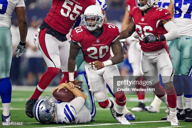 Deone Bucannon of the Arizona Cardinals celebrates after sacking the quarterback during a game against the Dallas Cowboys at AT&T Stadium during week...