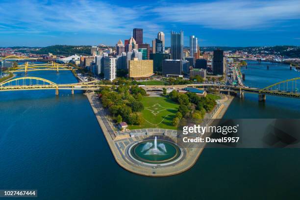 pittsburgh skyline aerial with fountain, two rivers and bridges - pennsylvania stock pictures, royalty-free photos & images
