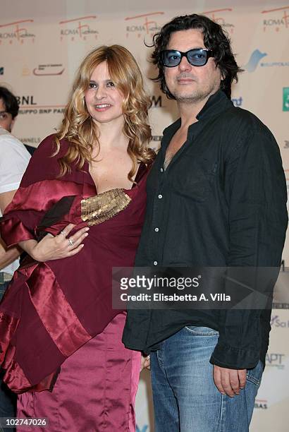 Debora Caprioglio and Angelo Maresca attend a photocall for "Wilma La Nuova Direttrice" during the Roma Fiction Fest at Adriano Cinema on July 8,...