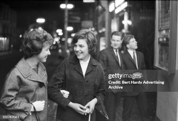 Two young women out shopping, 7th April 1962.