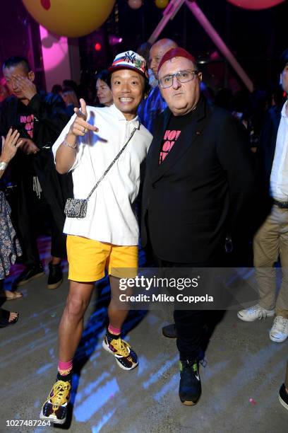 Alber Elbaz and a guest attends the Alber Elbaz X LeSportsac New York Fashion Week Party at Gallery I at Spring Studios on September 5, 2018 in New...