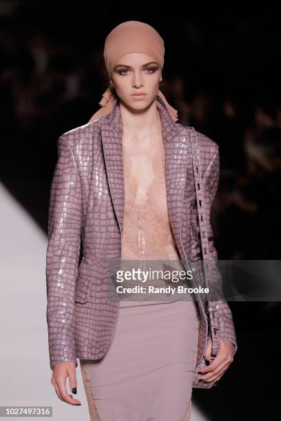 Model walks the runway during the Tom Ford fashion show September 2018 at New York Fashion Week at Park Avenue Armory on September 5, 2018 in New...