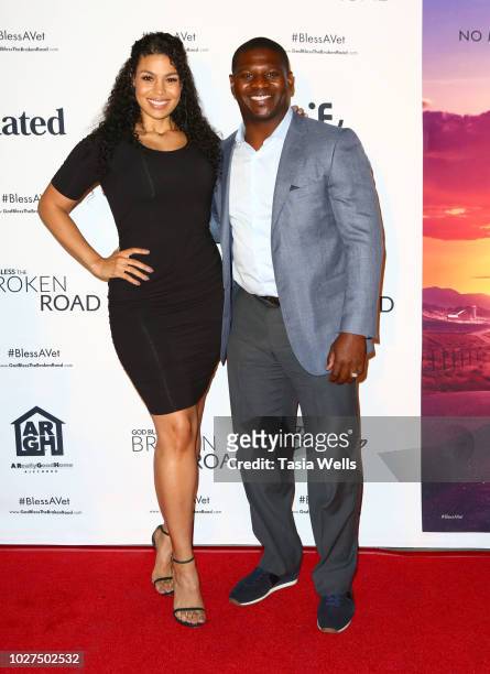 Jordin Sparks and LaDainian ÒLTÓ Tomlinson attend the screening of Entertainment Studios' "God Bless The Broken Road" at Silver Screen Theater at the...