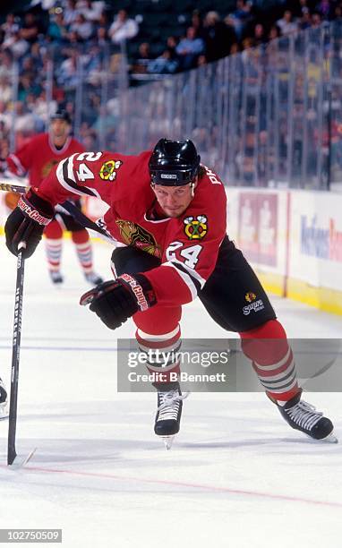 Bob Probert of the Chicago Blackhawks skates up the ice during an NHL game circa September, 1996.