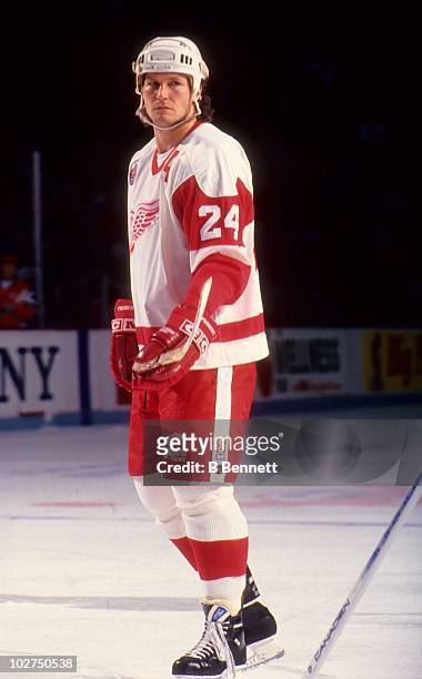 Bob Probert of the Detroit Red Wings looks on during an NHL game circa 1993 at the Joe Louis Arena in Detroit, Michigan.