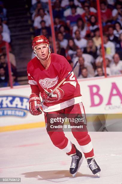 Bob Probert of the Detroit Red Wings skates on the ice during an NHL game against the Philadelphia Flyers circa 1990 at the Spectrum in Philadelphia,...