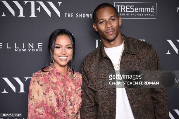 Model Karrueche Tran and US football player Victor Cruz attend the NYFW Kick-Off Party hosted by E! Entertainment, ELLE & IMG at The Pool, The...
