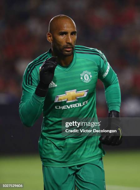 Goalkeeper Lee Grant of Manchester United jogs toward the ball in the first half during the International Champions Cup 2018 match against AC Milan...