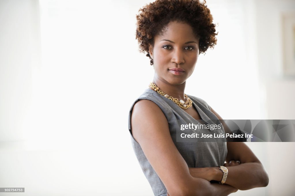 Black businesswoman with arms crossed