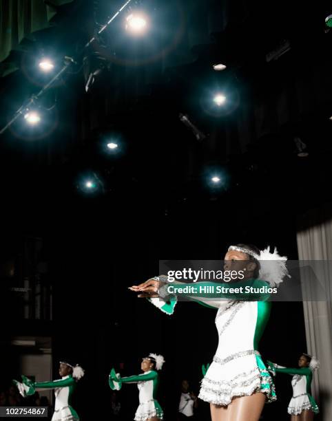black student dance team performing on stage - teen cheerleader stock-fotos und bilder