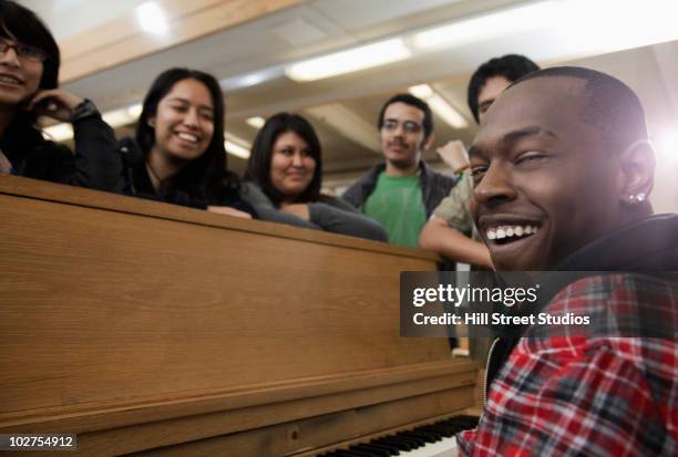 students singing in classroom - pianist front stock pictures, royalty-free photos & images