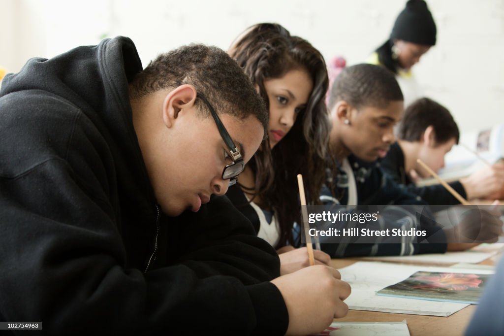 Students studying in classroom