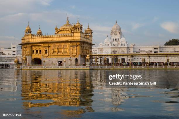 the golden temple (also known as sri harmandir sahib gurdwara) during the vaisakhi festival in amritsar, punjab, india - baisakhi stock pictures, royalty-free photos & images