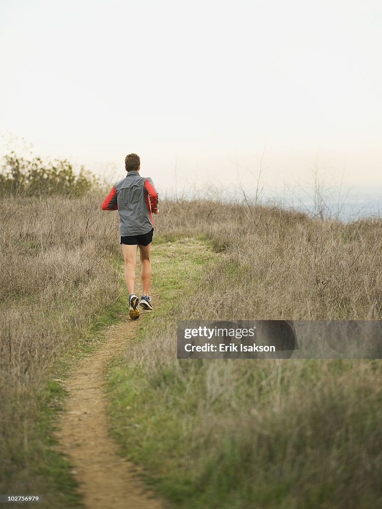 Person running on trail