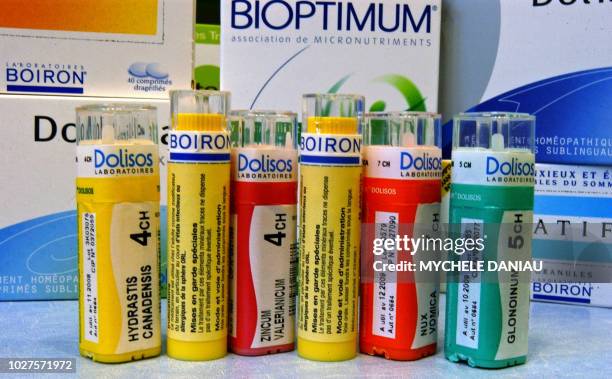. Photo de boîtes de médicaments homéopathiques de marques Dolisos et Boiron réalisée le 22 février 2005 à Caen. Un an après l'absorption du groupe...