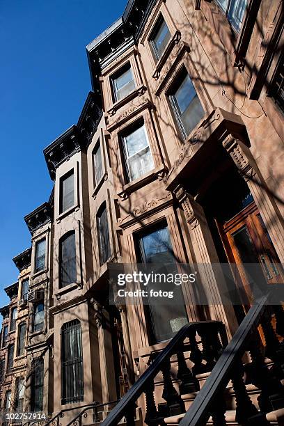 low angle view of townhouse - brooklyn brownstone stock pictures, royalty-free photos & images