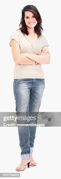 portrait of a young woman - woman wearing white jeans stock-fotos und bilder