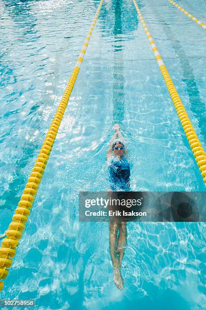 woman swimming laps - backstroke fotografías e imágenes de stock