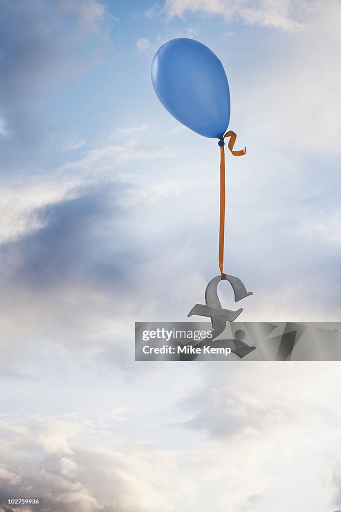 Balloon tied to a British pound symbol