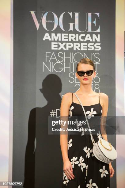 Models wears designs from the Contemporary Edit show at David Jones during Vogue American Express Fashion's Night Out on September 6, 2018 in Sydney,...