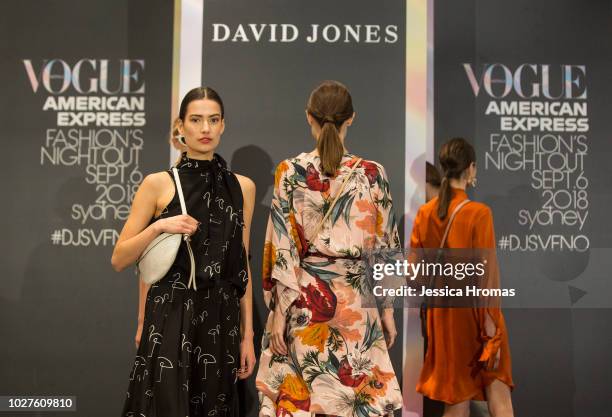 Models wears designs from the Contemporary Edit show at David Jones during Vogue American Express Fashion's Night Out on September 6, 2018 in Sydney,...