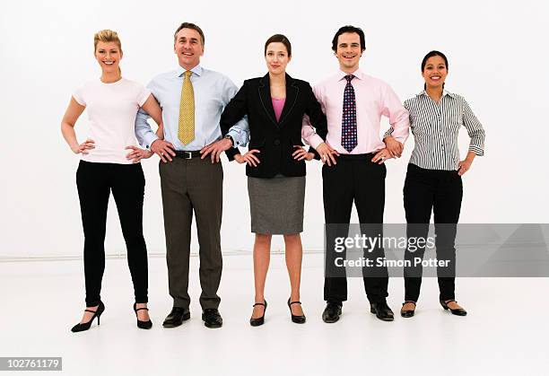 confident business people united - community arm in arm stock pictures, royalty-free photos & images