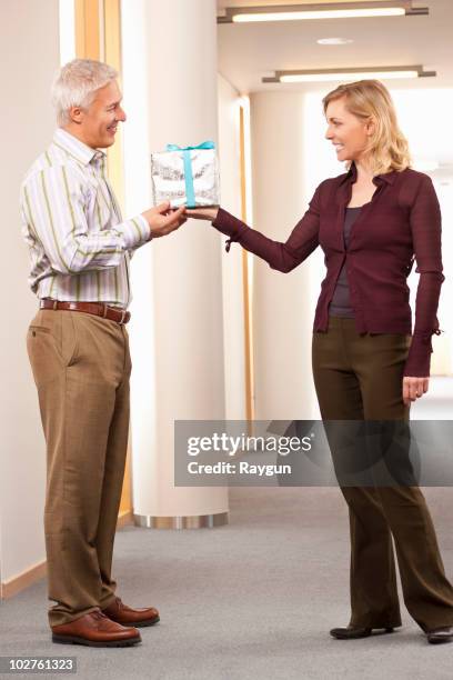 Man Getting Gift Business Man Giving A Gift Photos and Premium High Res Pictures - Getty ...