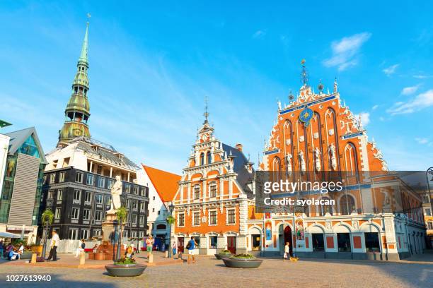 old city hall square of riga - riga stock pictures, royalty-free photos & images