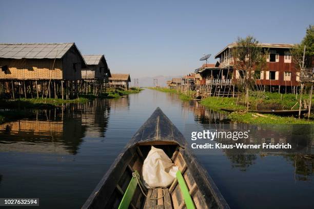 main channel through the village of the inthas in mang-thawk, inle lake, shan state, myanmar, burma, southeast asia - southeast stock pictures, royalty-free photos & images