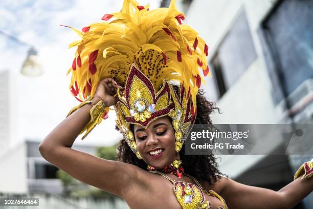 brazilian woman dancing samba for the famous carnival parade - samba dancing stock pictures, royalty-free photos & images