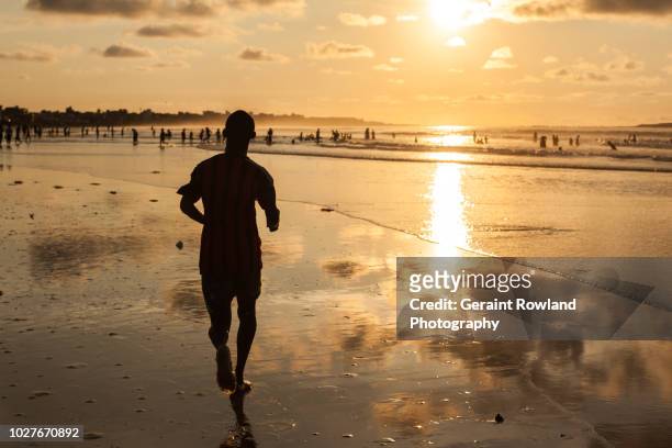 silhouetted sunset, senegal - dakar stock pictures, royalty-free photos & images