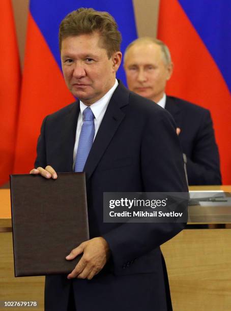 Gazprom CEO Alexei Miller and President Vladimir Putin attend Russian-Vietnamese talks September 6, 2018 in Sochi, Russia. Nguyen Phu Trong,...