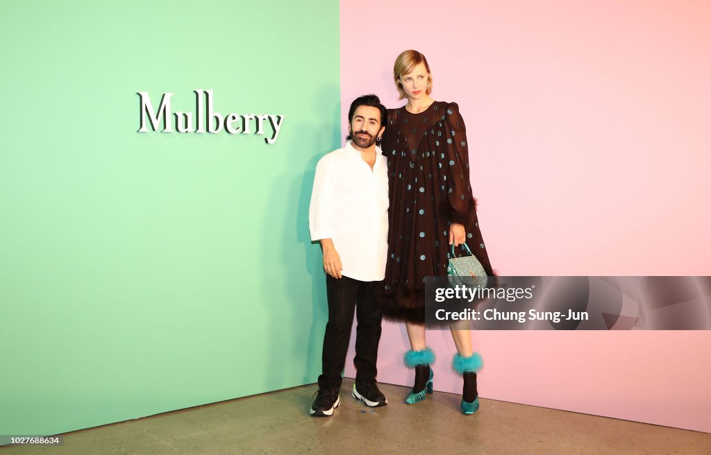Mulberry Creative Director Johnny Coca and Model Edie Campbell attend