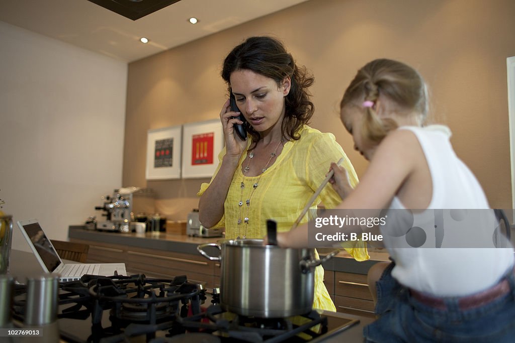 Mother cooking under stress