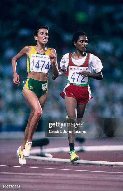 Summer Olympics: Ethiopia Derartu Tulu in action vs South Africa Elana Meyer during Women's 10,000M Final at Estadi Olimpic de Montjuic. Barcelona,...