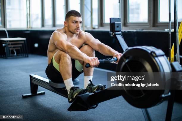 In Shape Rowing Man Man Rowing Gym Photos and Premium High Res Pictures - Getty Images