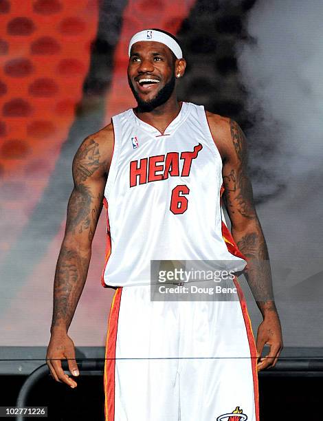 LeBron James of the Miami Heat greets fans as he is introduced during a welcome party at American Airlines Arena on July 9, 2010 in Miami, Florida.
