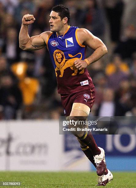 Brendan Fevola of the Lions celebrates after scoring a goal during the round 15 AFL match between the Brisbane Lions and the St Kilda Saints at The...